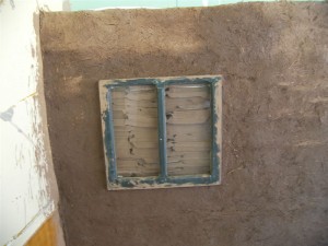 Truth window in book-insulated wall