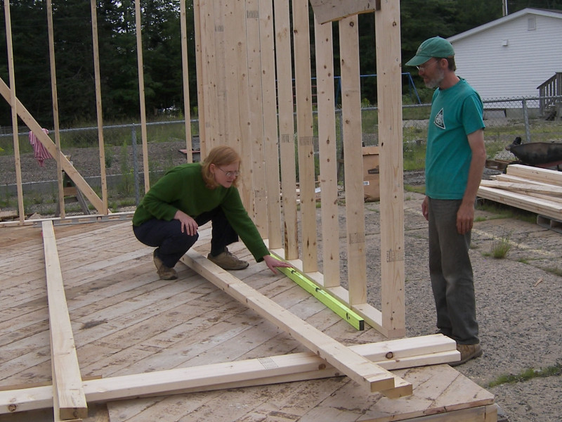 Pam checks the level